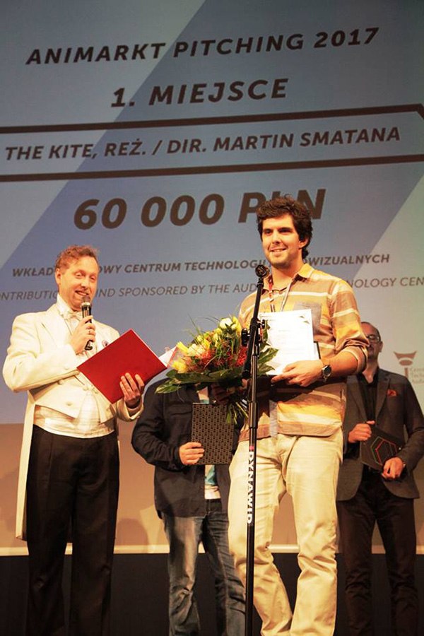 Martin Smatana receiving the Grand Prix pitching award for The Kite [photo credit Tomasz Kaluzny]